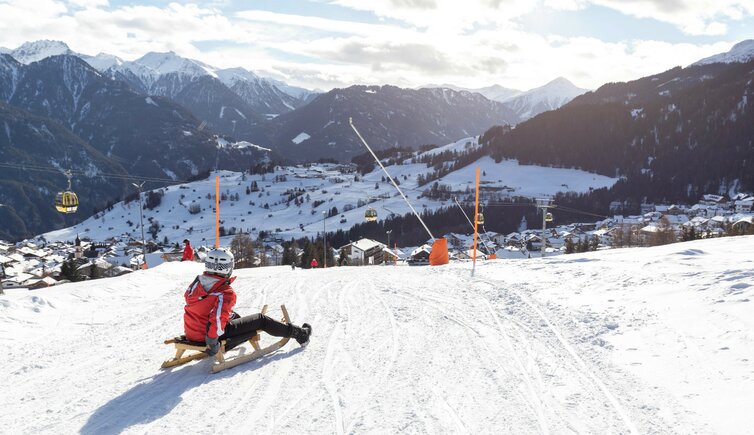 SFL Rodelbahn Fiss mit Dorfblick